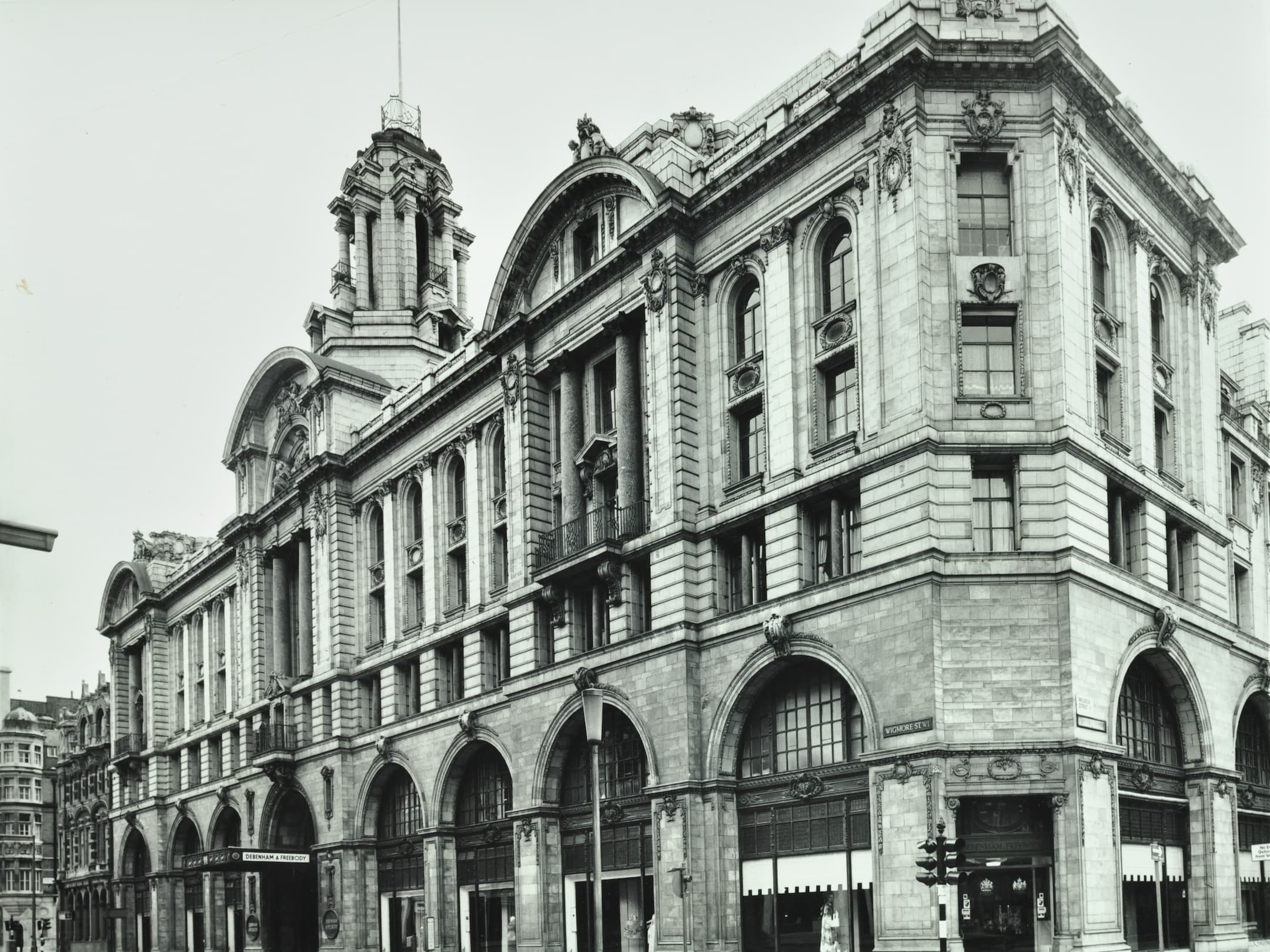 exterior of building with classical features and arches over the windows