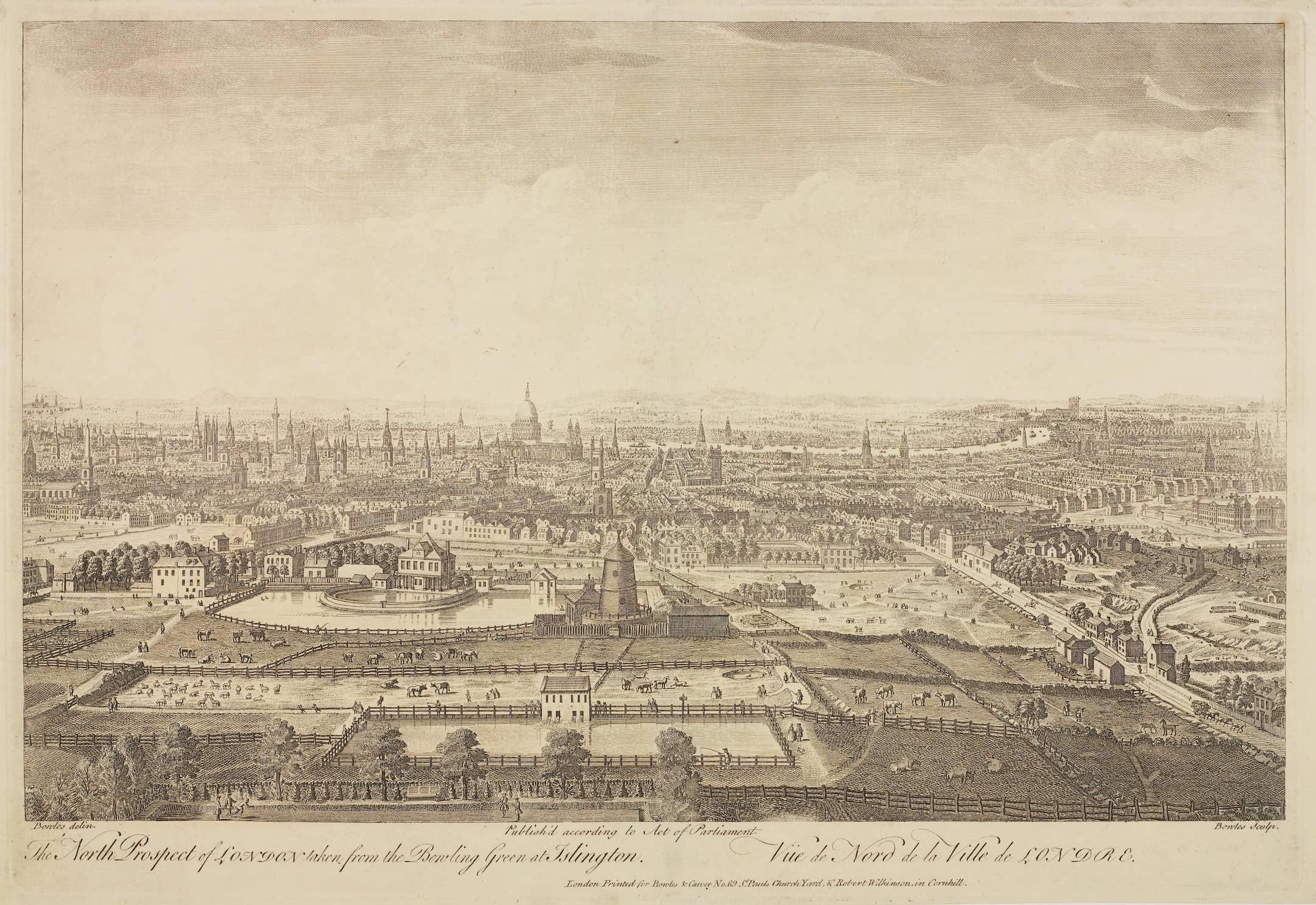 view of a city scape with river and cathedral on the horizon