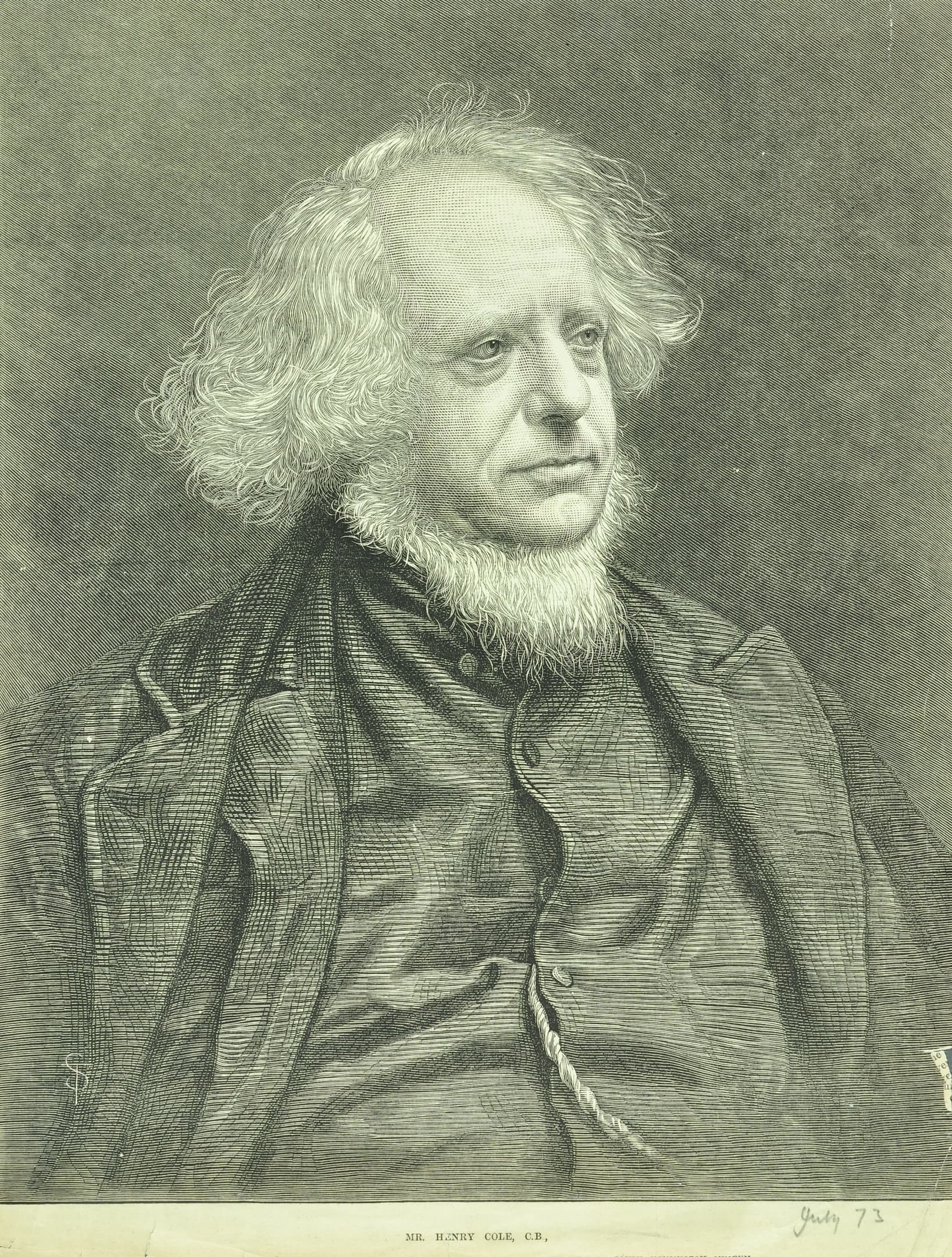 a man with a prominent beard and wavy hair is seated