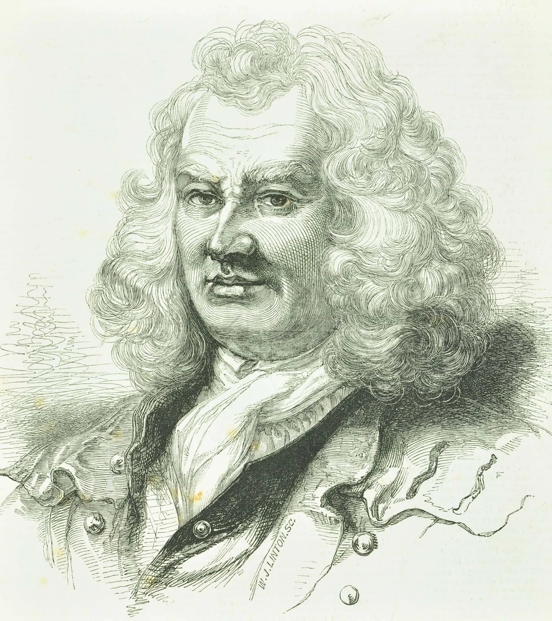 a man with a full head of curls and bushy eyebrows with a neck scarf