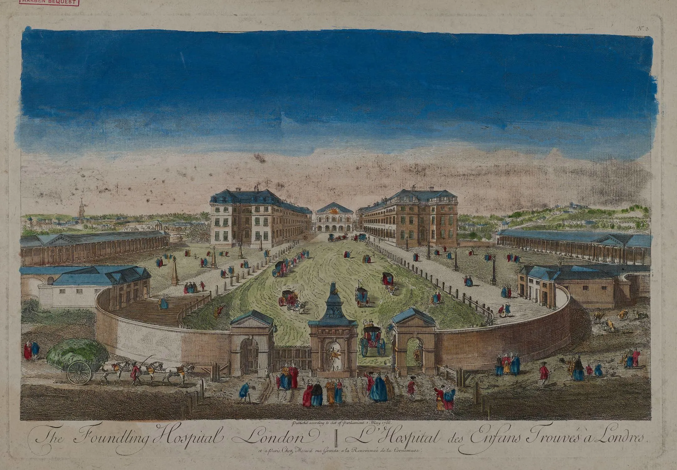 A large building set back from a walled garden