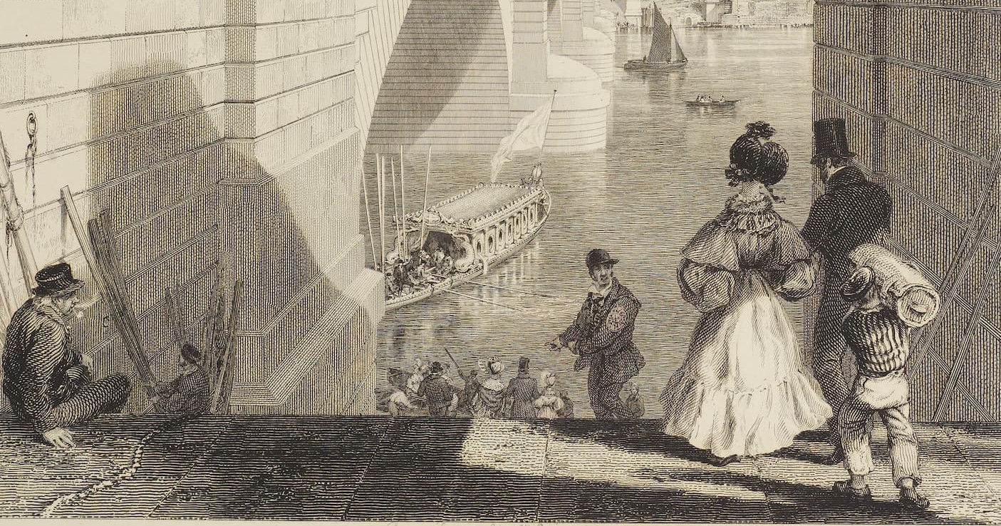 people wait on the side of the river bank to be escorted to a boat by the bridge