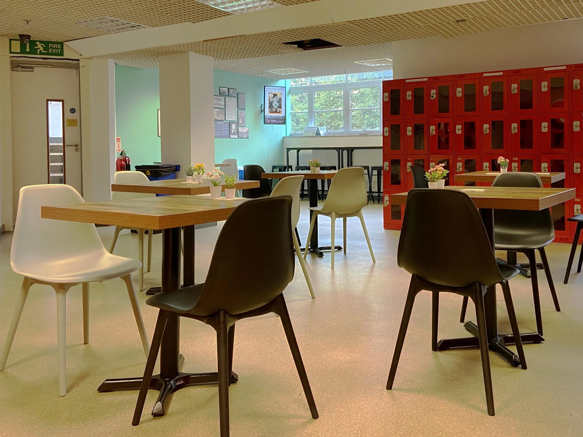 Tables, chairs and lockers in the Visitor Lounge at The London Archives