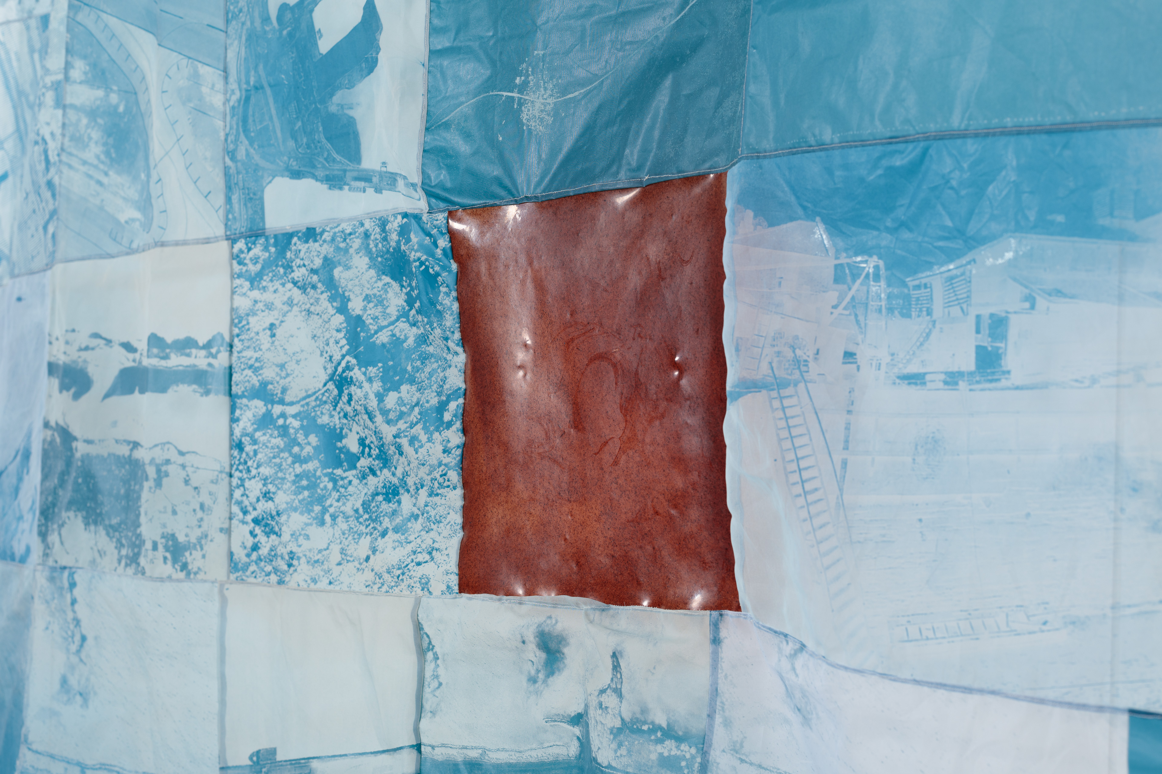 Artwork of interlocking images which have been digitally manipulated on a silkscreen 