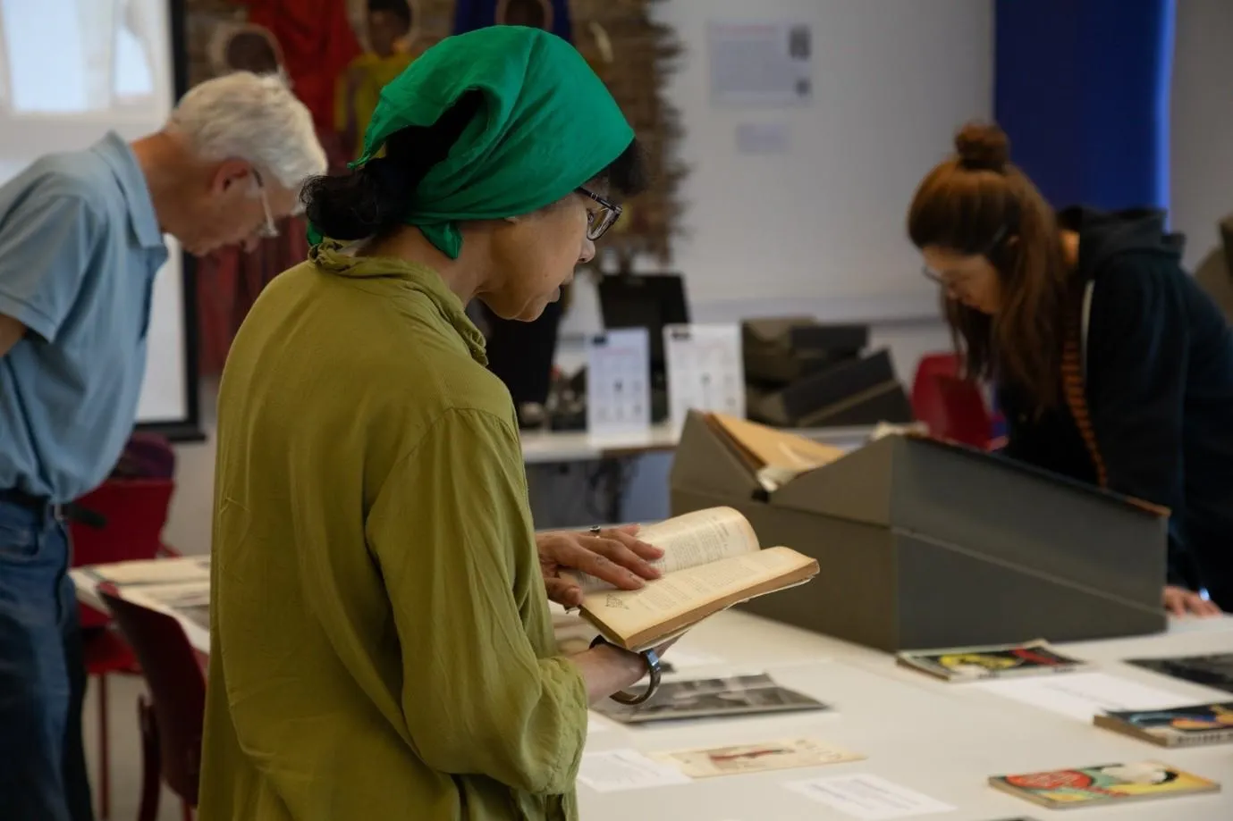 people looking at documents