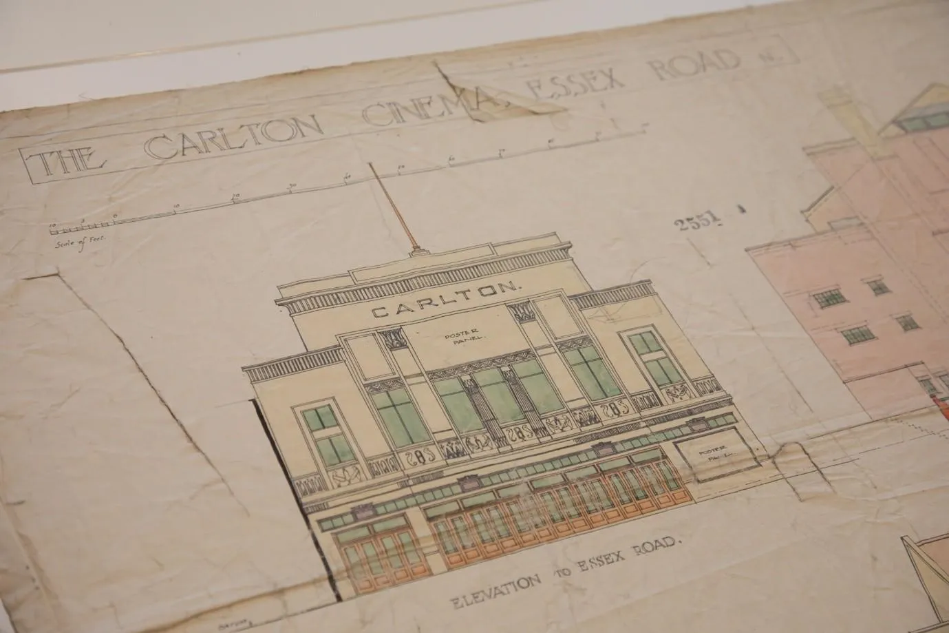 drawing of the front of a cinema with Egyptian details in an art deco style