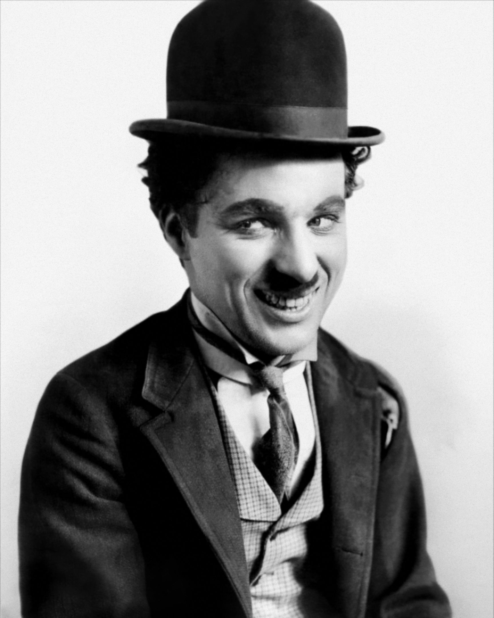a man with moustache and bowler hat