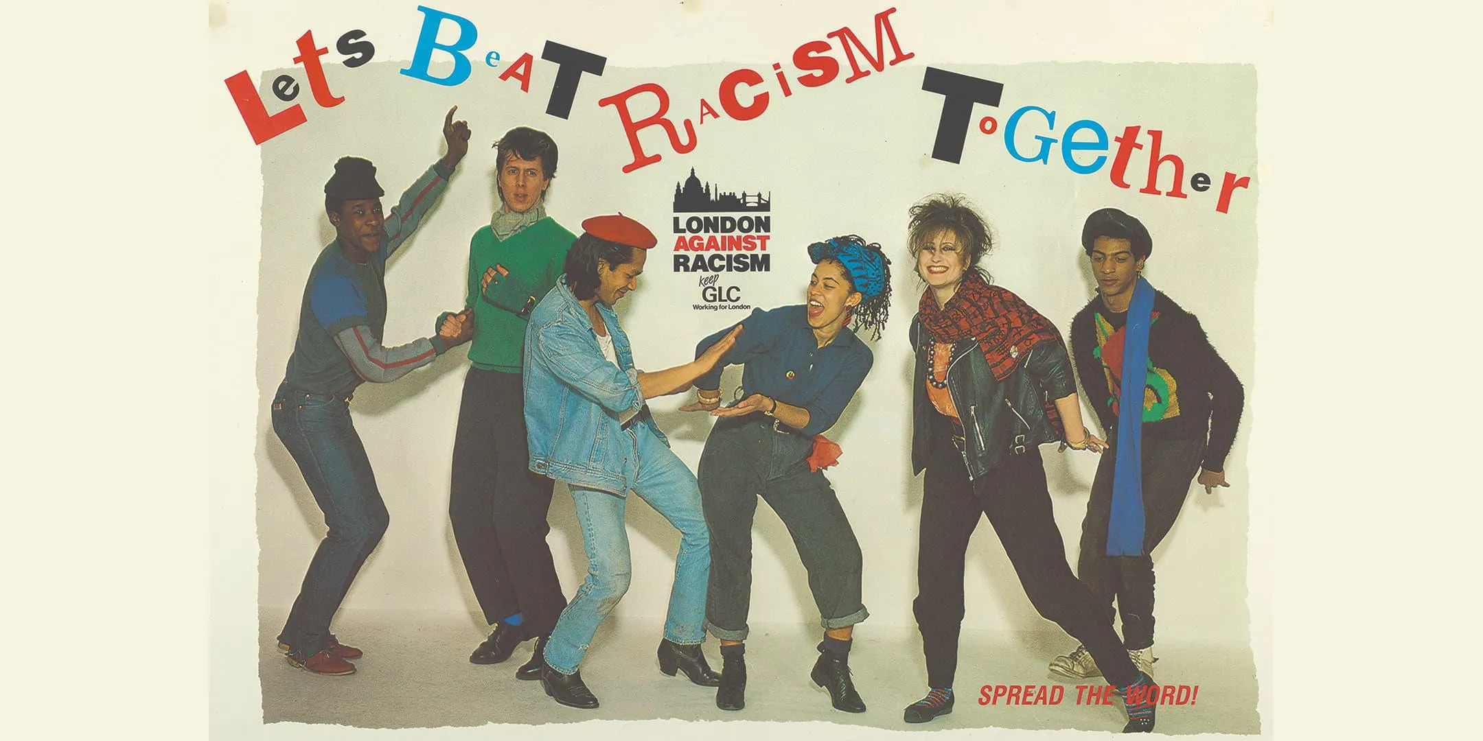 a group of people in clothes from the 1980s under the banner 'lets beat racism together'