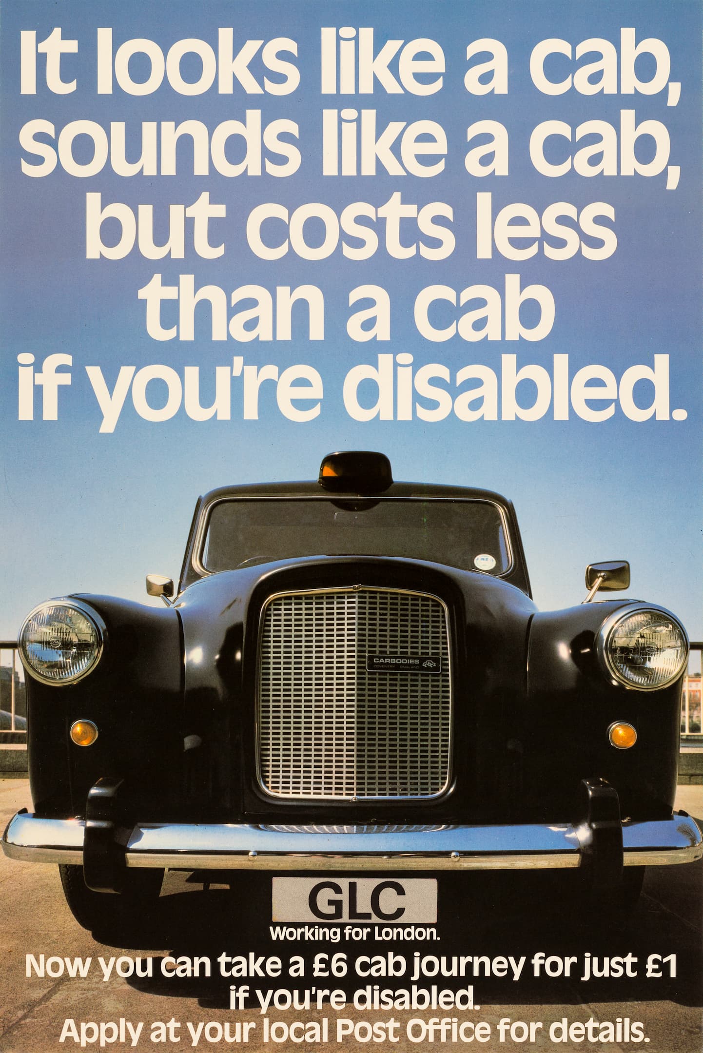 the front of a black taxi with words on the poster offering cheaper journeys to disabled Londoners