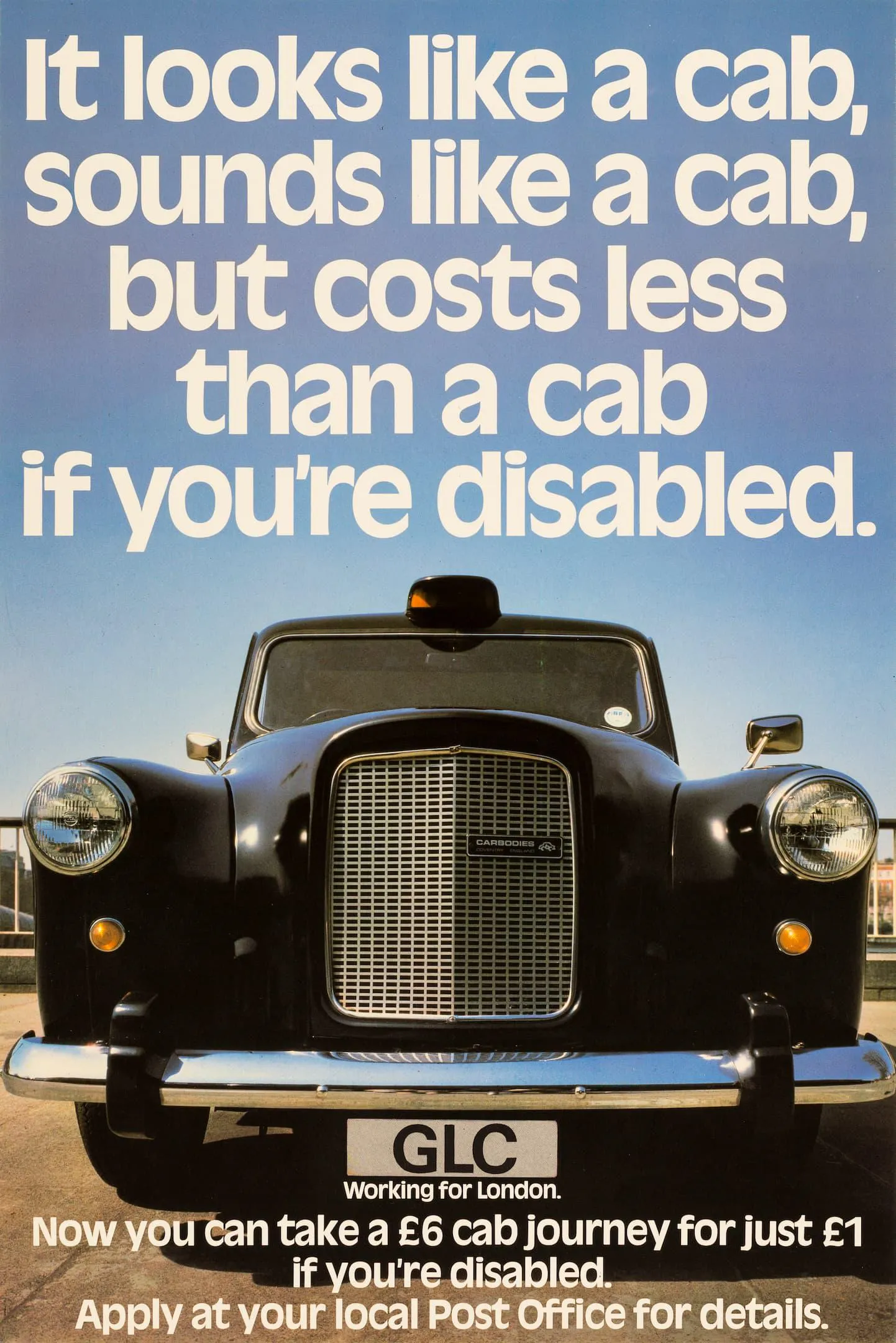 the front of a black taxi with words on the poster offering cheaper journeys to disabled Londoners