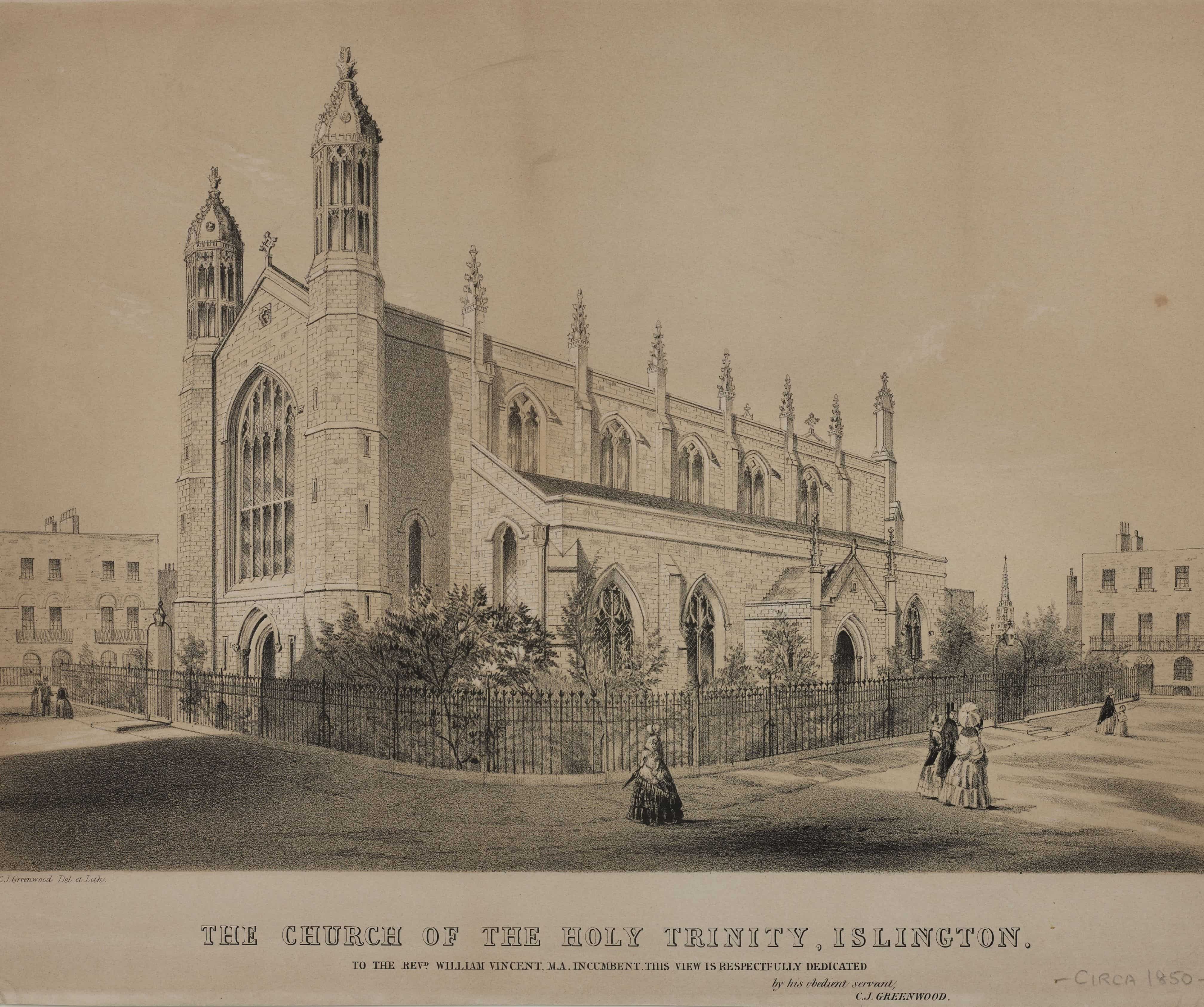 Holy Trinity church, Islington with a fence around the outside and people in the foreground