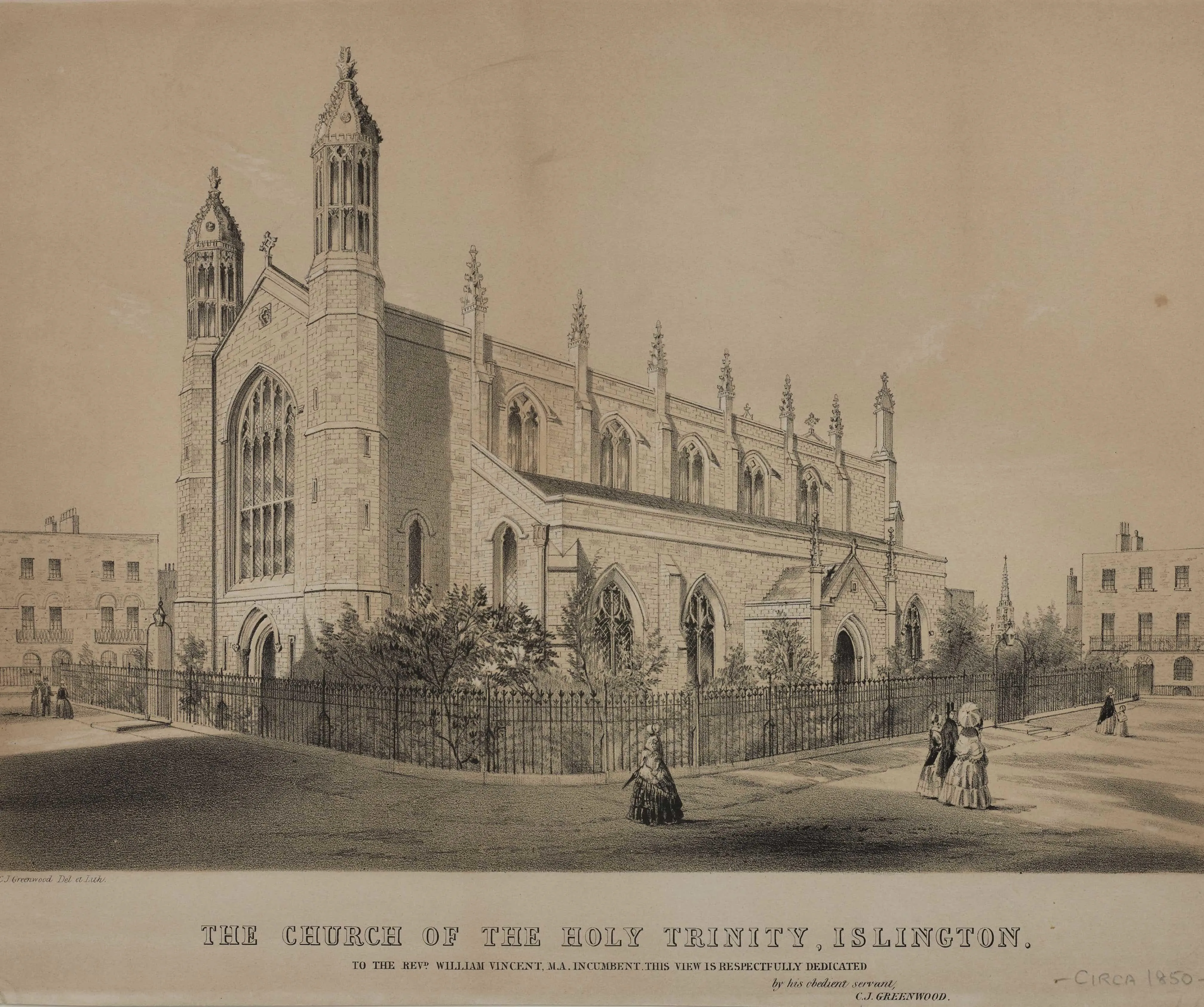 Holy Trinity church, Islington with a fence around the outside and people in the foreground