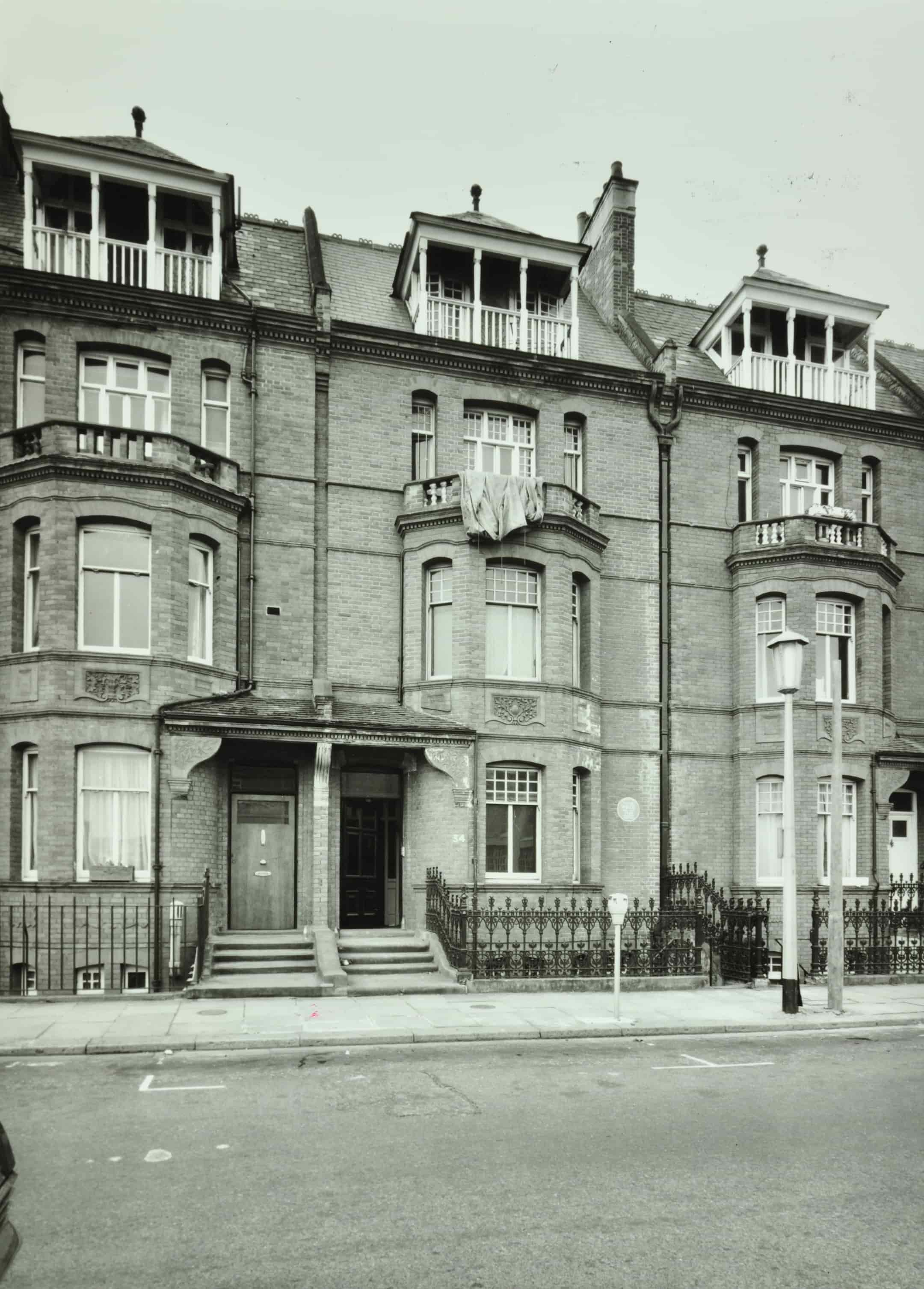 Terrace Houses on Tite Street, empty road outside. 