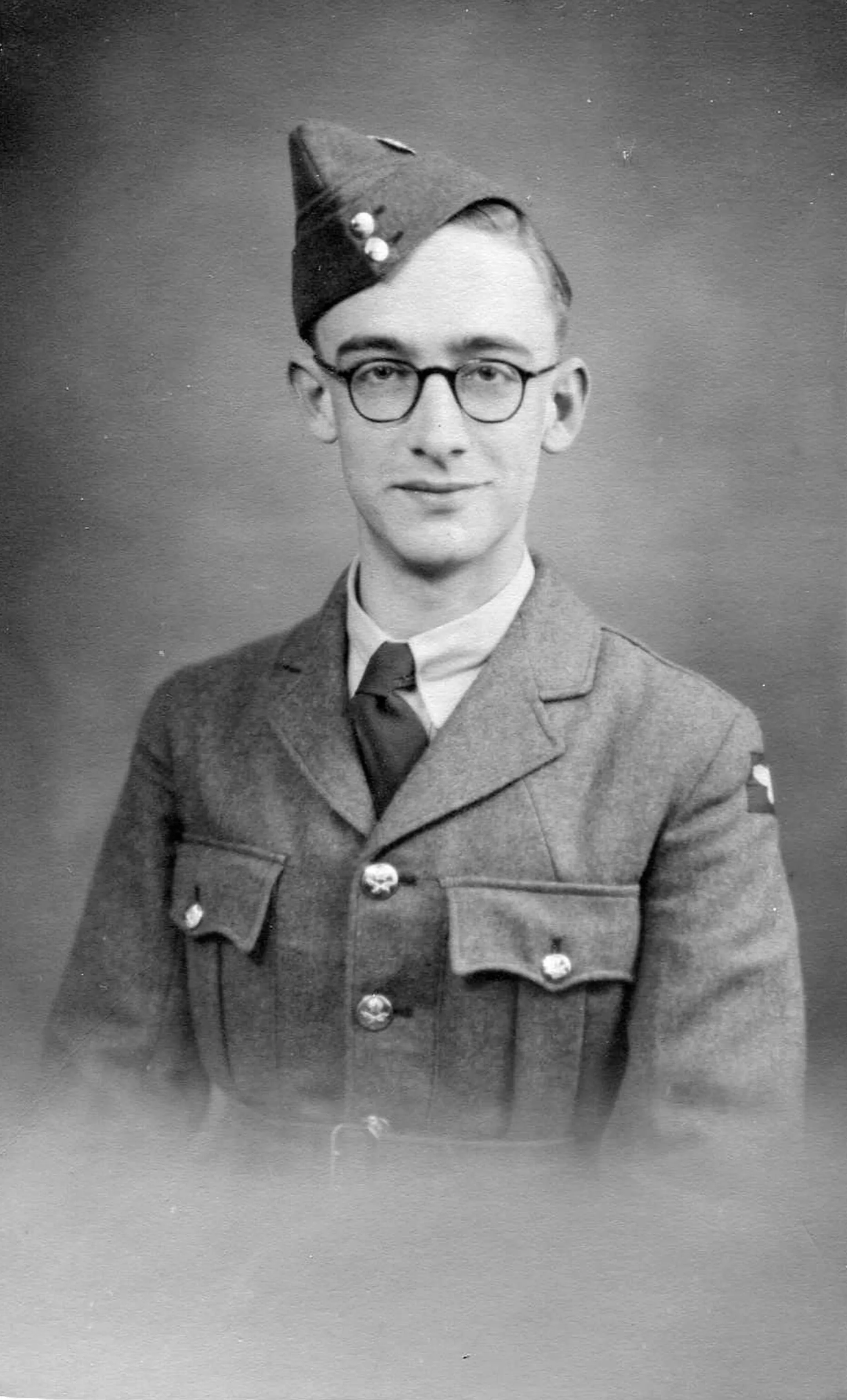 Photographic portrait of an RAF in glasses