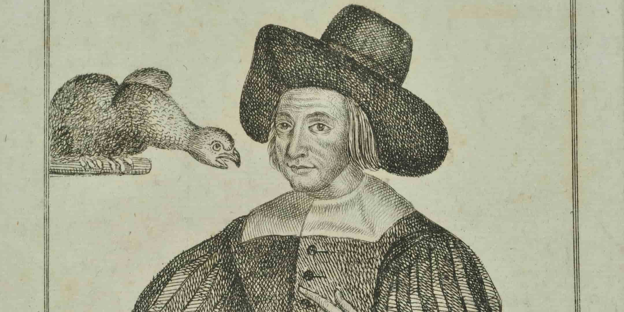 A woman wearing mens clothing and hat, a bird on her left is sat on a branch 