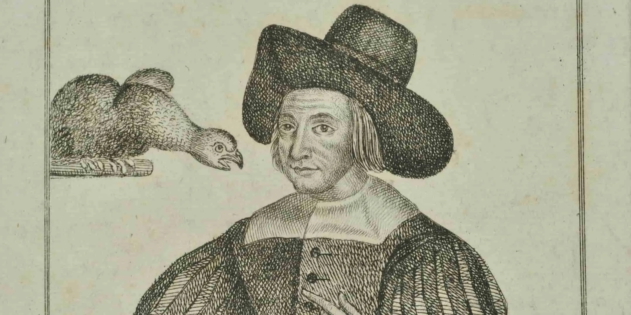 A woman wearing mens clothing and hat, a bird on her left is sat on a branch