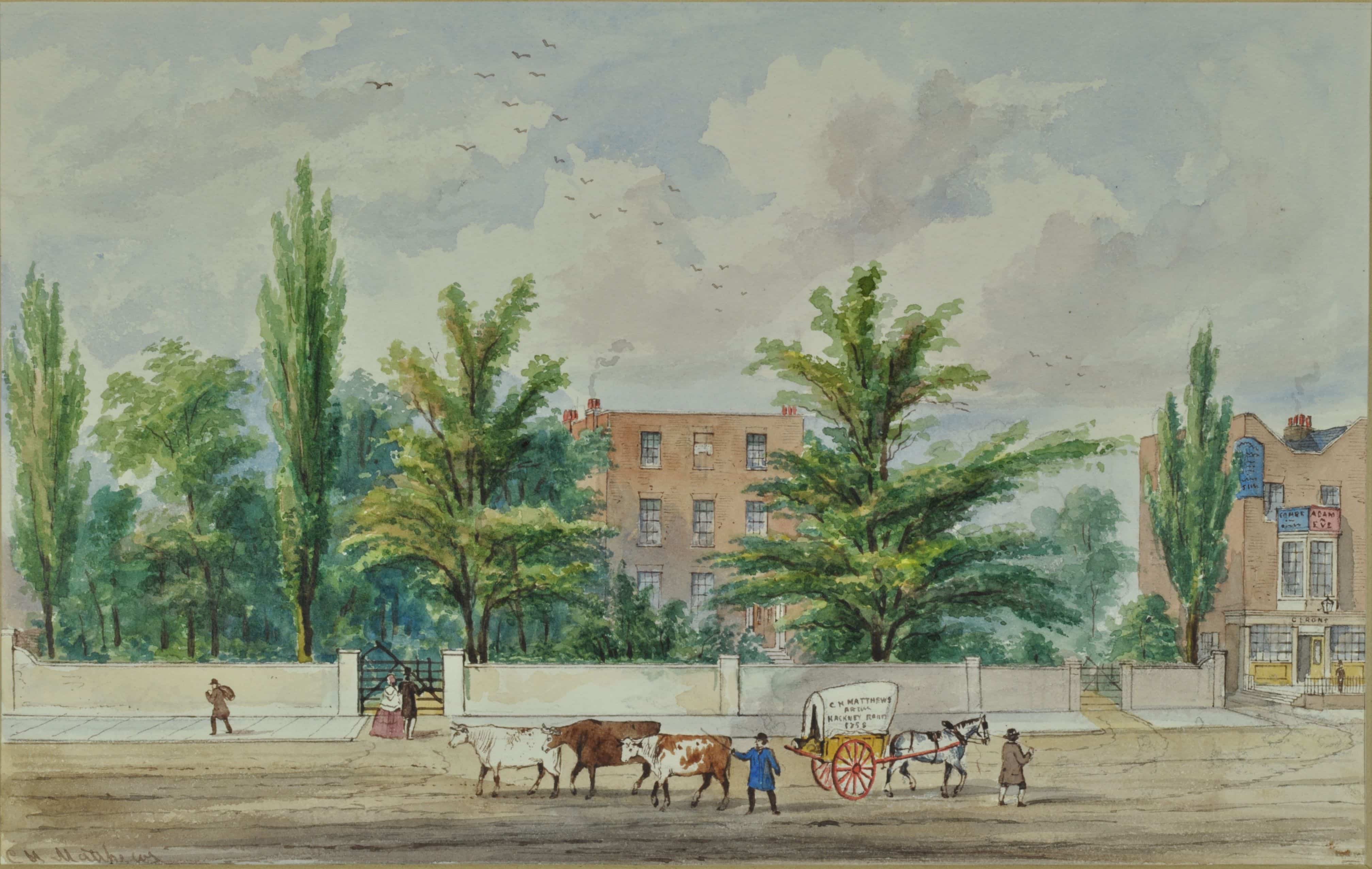 a large house behind some trees and a horse and cart are outside, next to some cattle. 