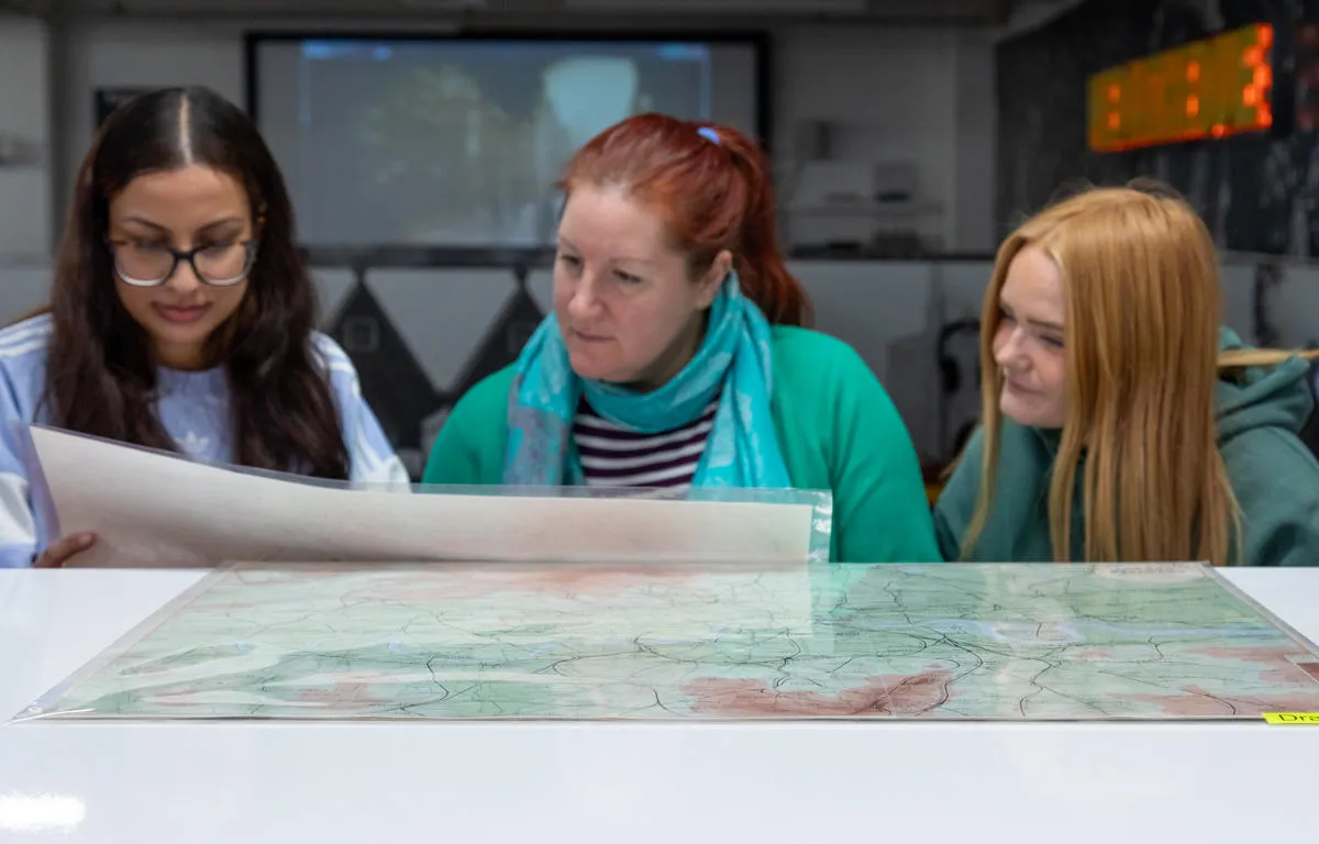 people-looking-at-a-map