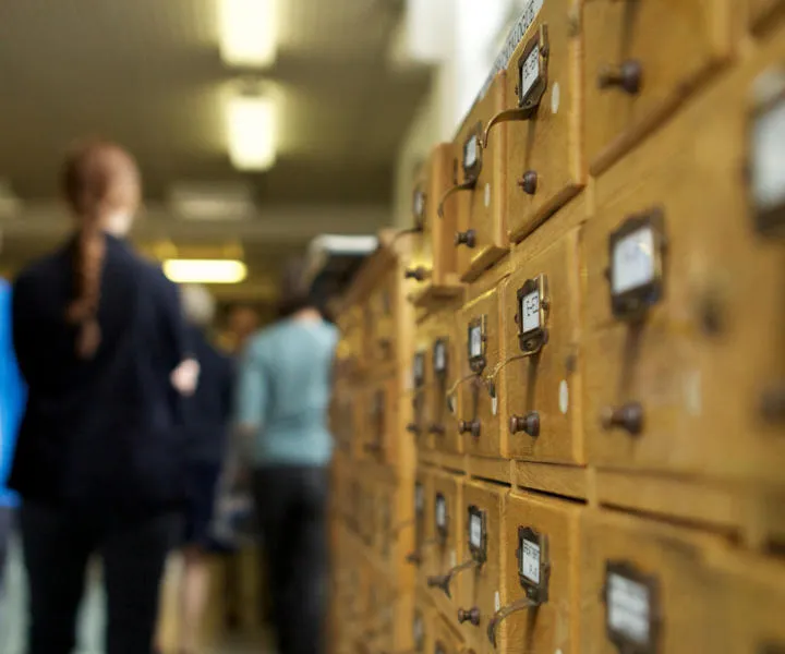 People-walking-through-hallway