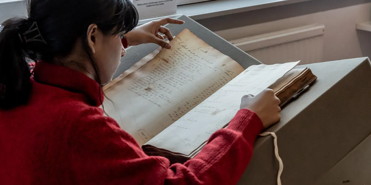 researcher-looking-at-large-archive-in-asa
