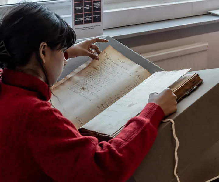 researcher-looking-at-large-archive-in-asa