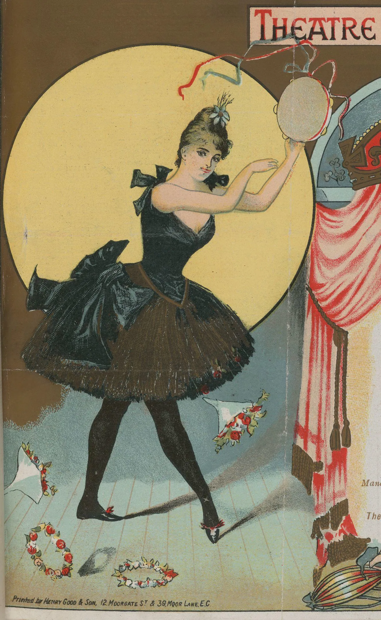 a woman in a tutu dances with a tambourine on the stage of a theatre