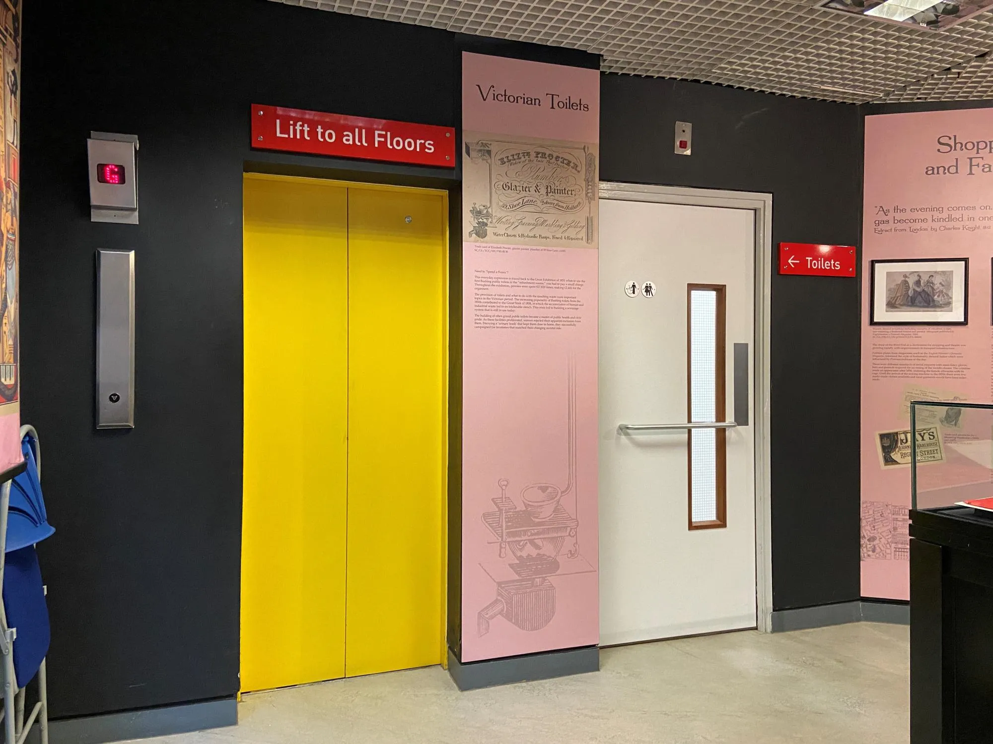Doors to the list and toilets on the first floor at The London Archives.