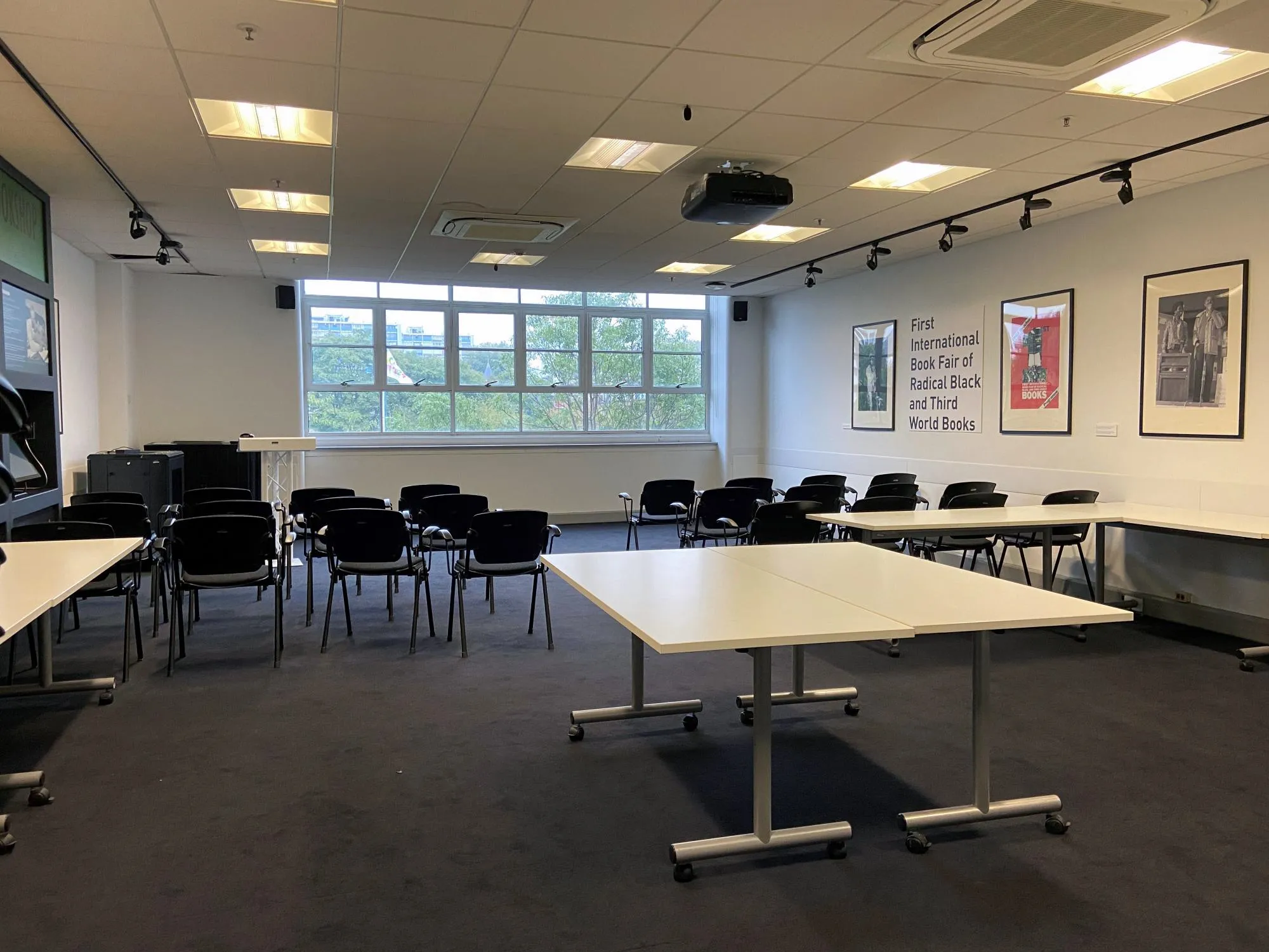 The Huntley Rom at The London Archives, laid out with tables and chairs for an audience