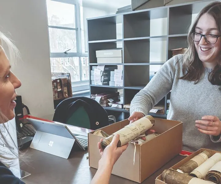 visitor-collecting-archive-document