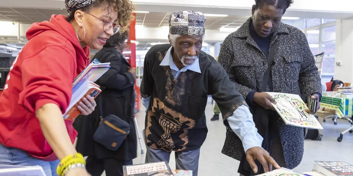 visitors-at-the-huntley-conference-looking-at-books